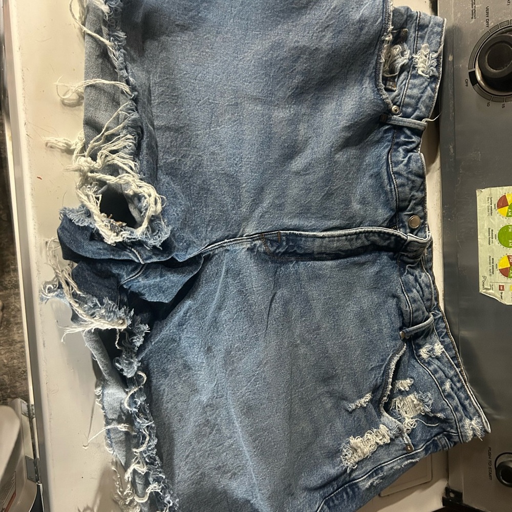 Good American Light Blue Distressed Denim Cutoff Shorts